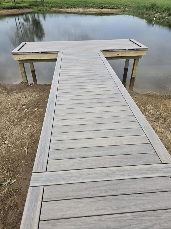 T-shaped dock on a farm pond